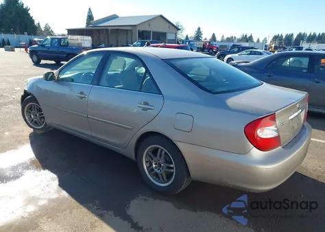 2003 Toyota Camry Le z USA, uszkodzony, nr VIN 4T1BE32K23U698744